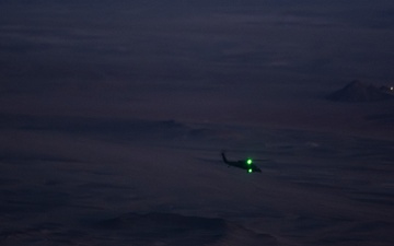 Air Force Jolly Green IIs refuel over USCENTCOM AOR