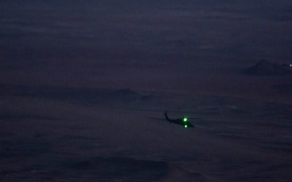 Air Force Jolly Green IIs refuel over USCENTCOM AOR