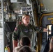 Tech. Sgt. Sydney Goddard, a loadmaster assigned to the 152nd Operations Group, talks to children about her job during a base tour at the Nevada Air National Guard Base on May 9, 2025