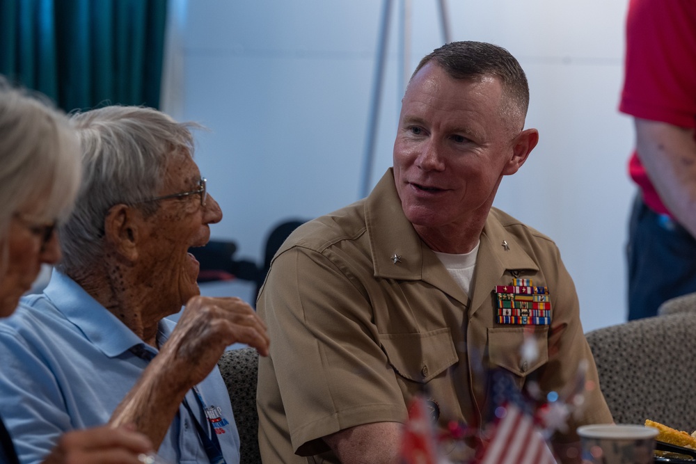 Iwo Jima Veteran celebrates 100th Birthday with Marines, Sailors, family aboard USS North Carolina