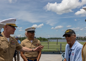 Iwo Jima Veteran celebrates 100th Birthday with Marines, Sailors, family aboard USS North Carolina