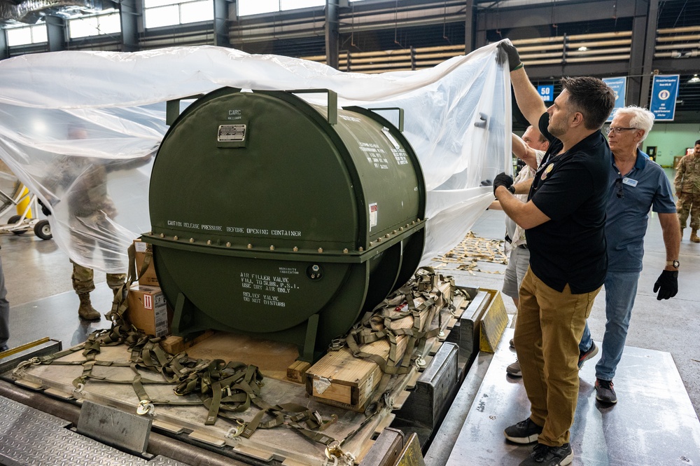 Honorary Commanders go behind the scenes at 436th MGG