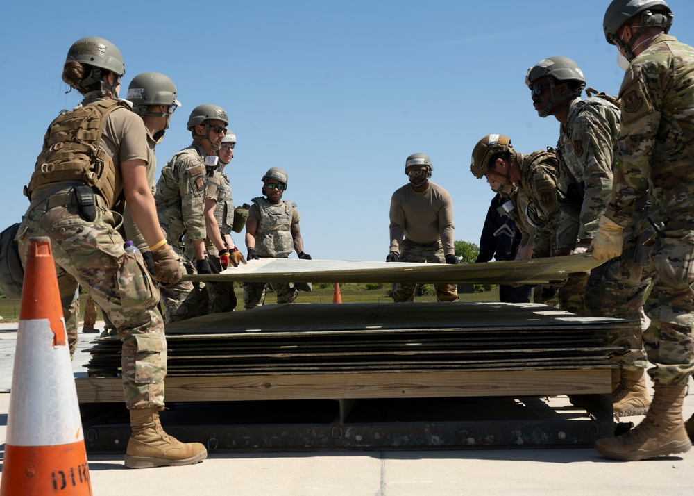 Skyway Chariot: Airmen repair a flight line