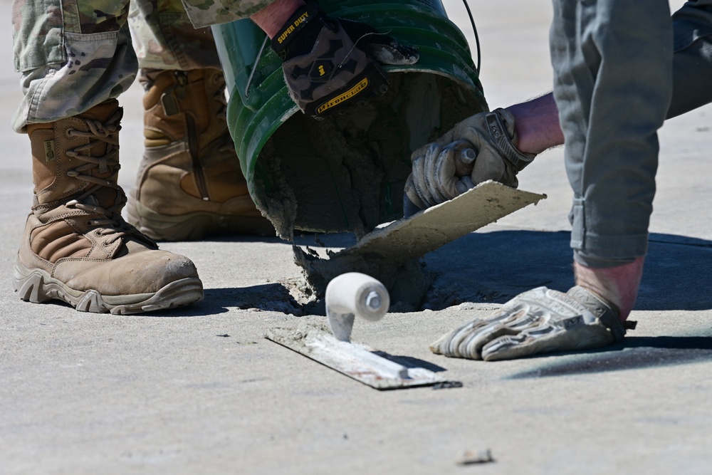 Skyway Chariot: Airmen repair a flight line