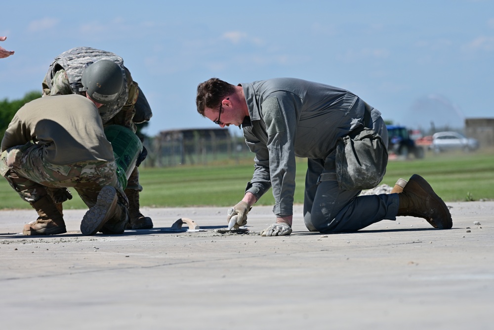 Skyway Chariot: Airmen repair a flight line