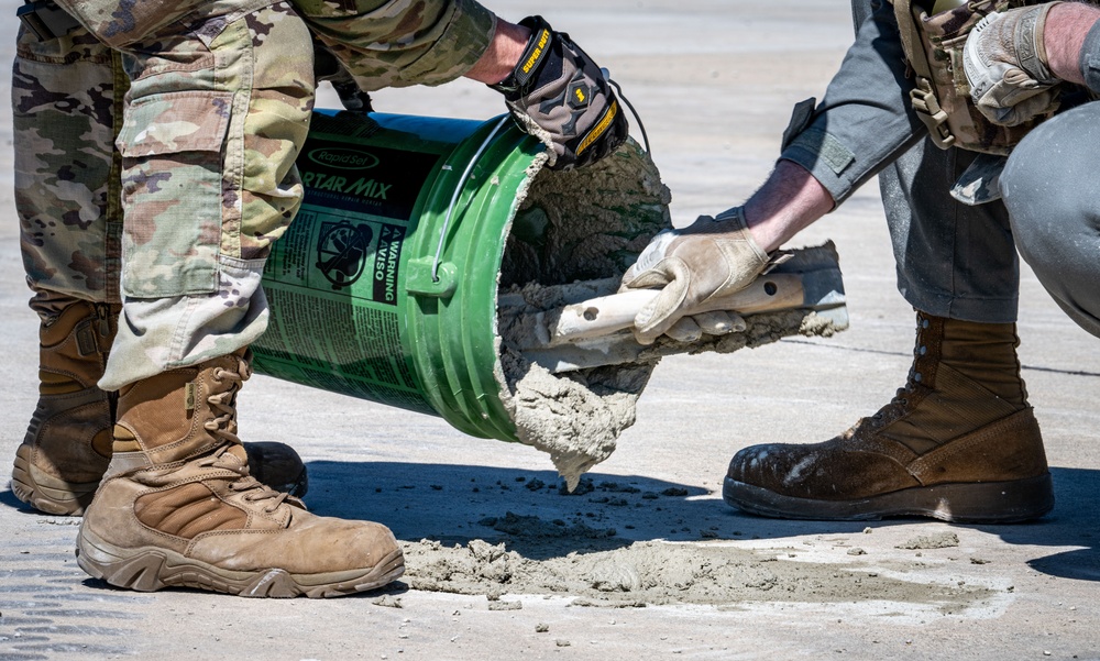 Skyway Chariot: Airmen repair a flight line