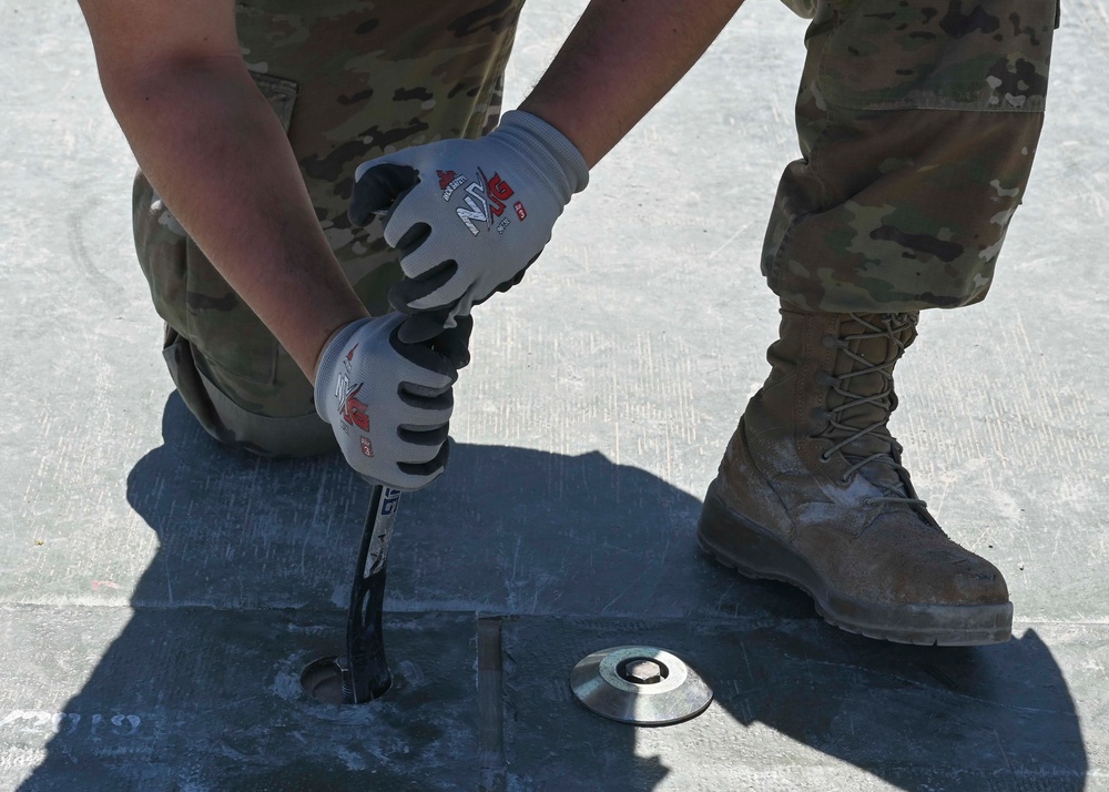 Skyway Chariot: Airmen repair a flight line
