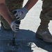 Skyway Chariot: Airmen repair a flight line