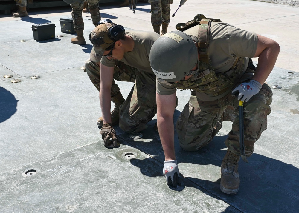 Skyway Chariot: Airmen repair a flight line