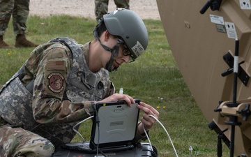 Skyway Chariot: Communications Airmen set up satellite terminal