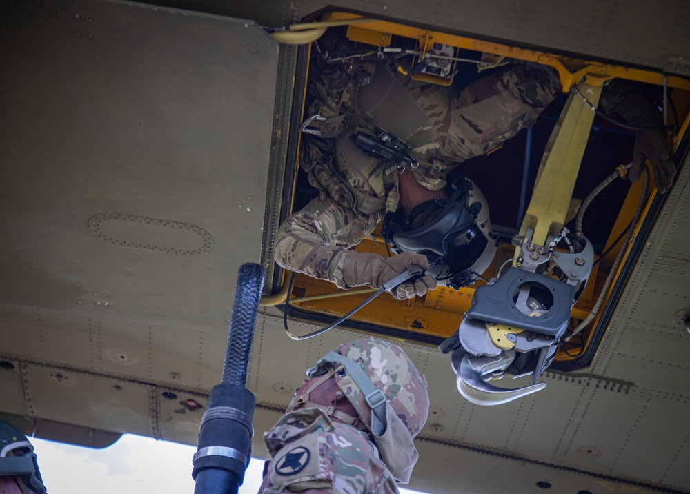 117th Field Artillery and the 169th Aviation train in sling load operations together