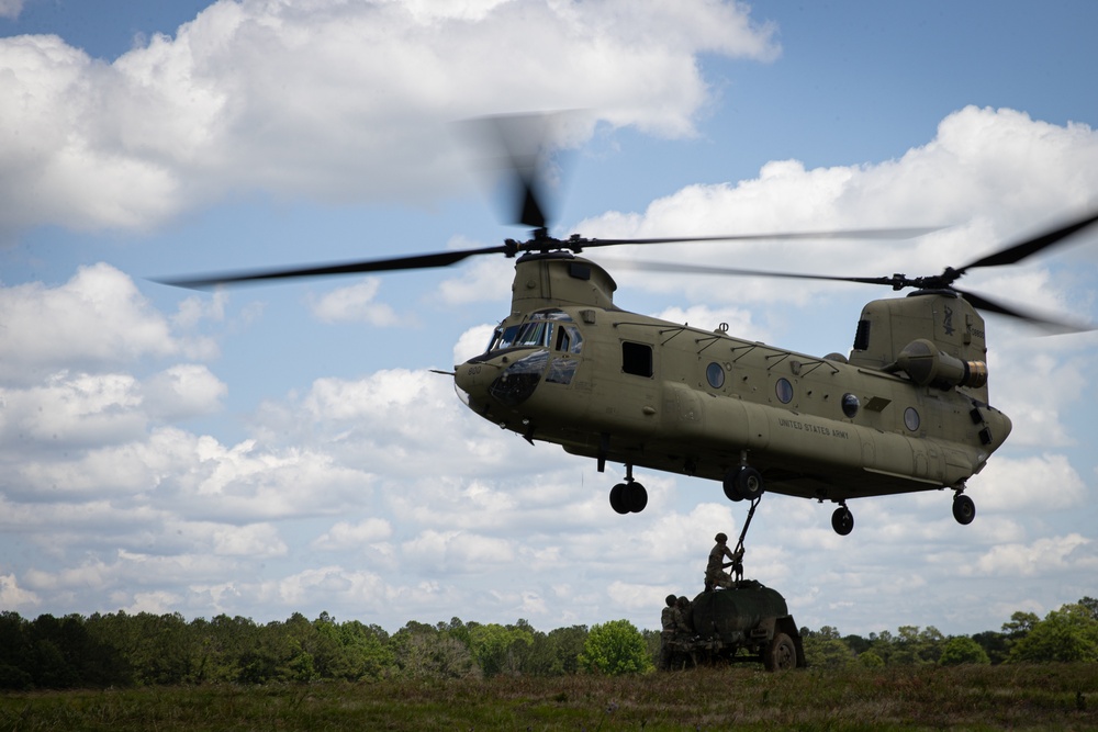 117th Field Artillery and the 169th Aviation train in sling load operations together