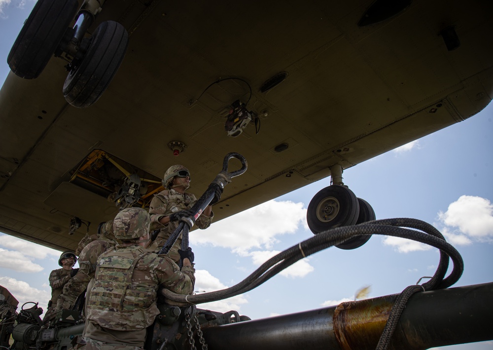 117th Field Artillery and the 169th Aviation train in sling load operations together