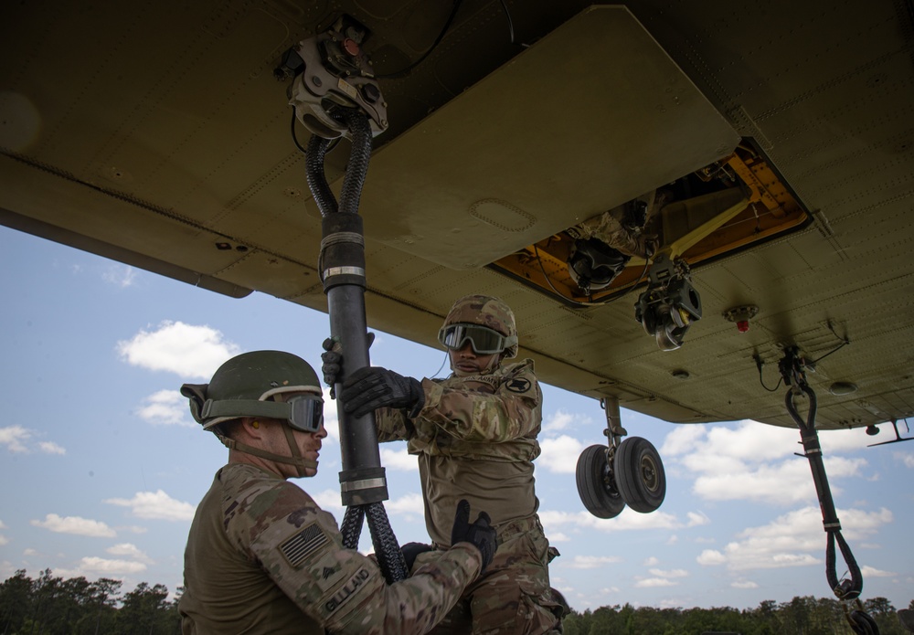 117th Field Artillery and the 169th Aviation train in sling load operations together