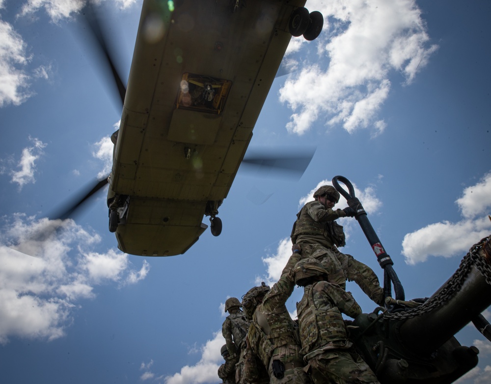117th Field Artillery and the 169th Aviation train in sling load operations together