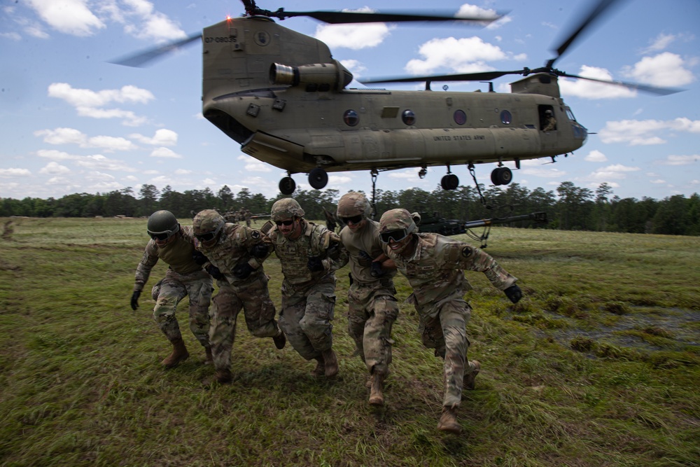 117th Field Artillery and the 169th Aviation train in sling load operations together