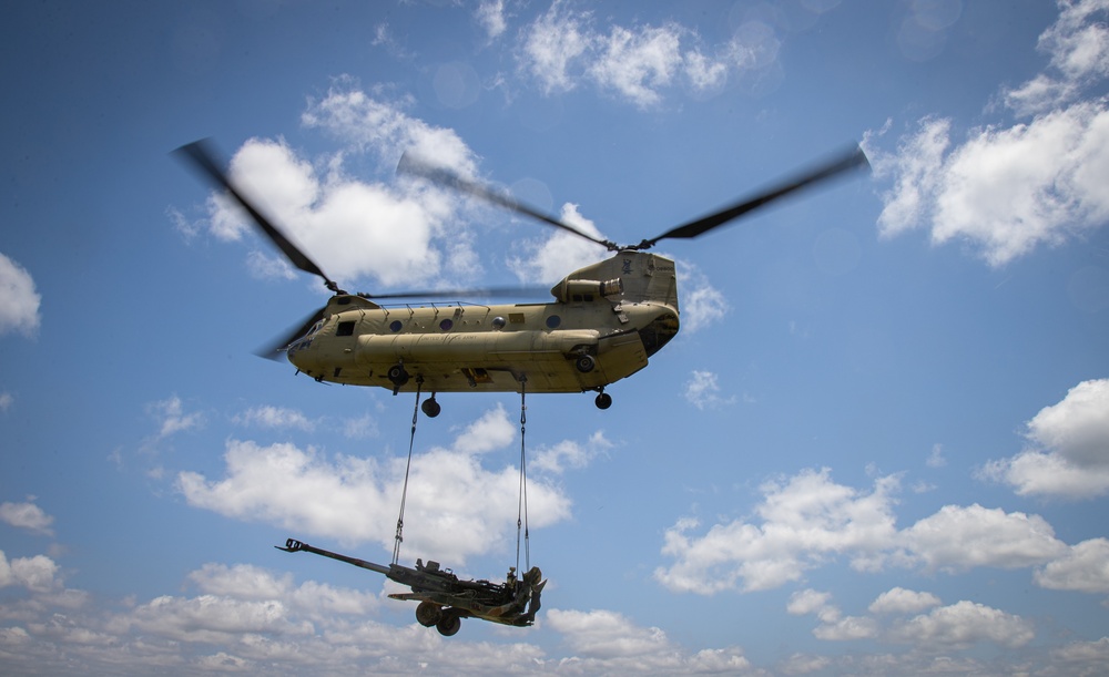 117th Field Artillery and the 169th Aviation train in sling load operations together