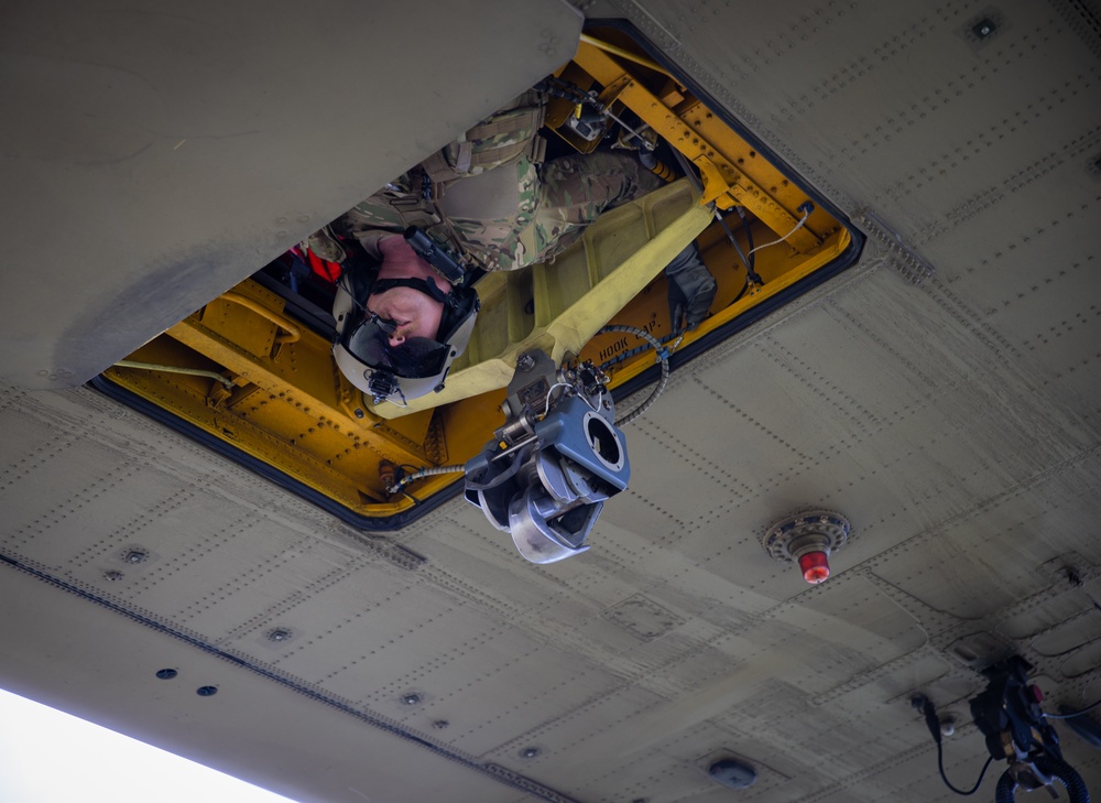 117th Field Artillery and the 169th Aviation train in sling load operations together