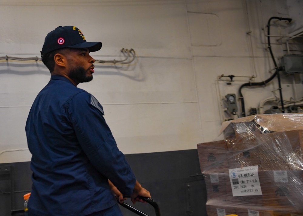 USS America (LHA 6) Conducts Stores Onload