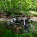 Barges remove hurricane Helene debris at in Macon County