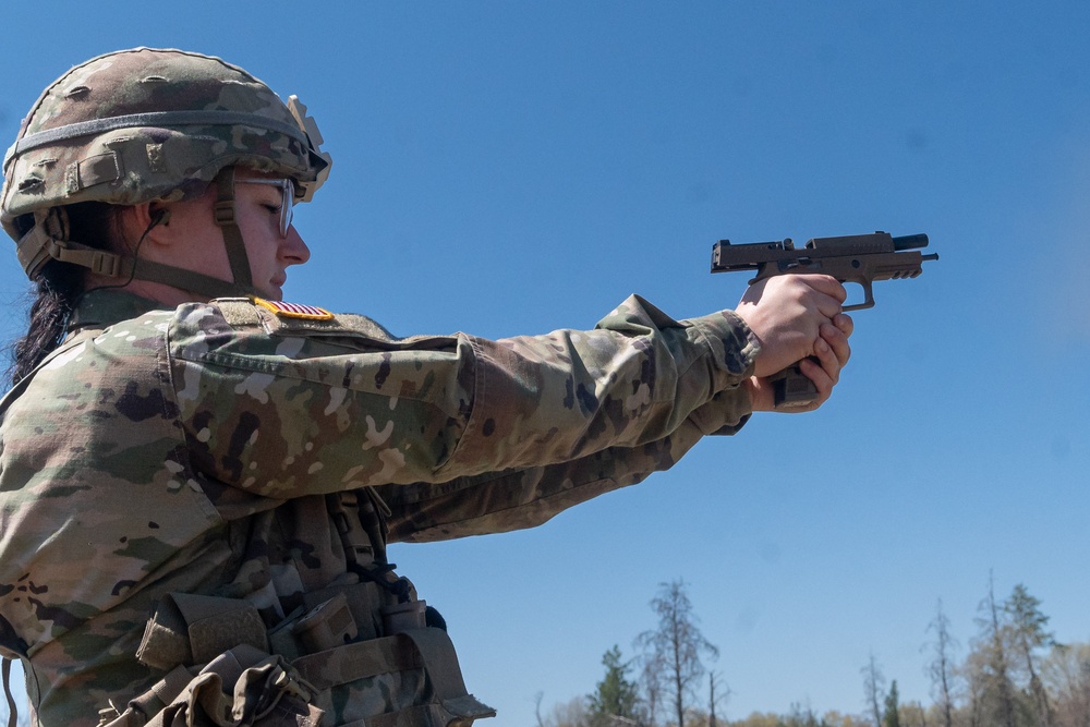 Sgt. Hallie Koches fires an M17 pistol