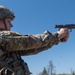 Sgt. Hallie Koches fires an M17 pistol