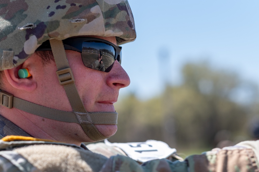 Spc. Kenton Skiba fires an M17 pistol