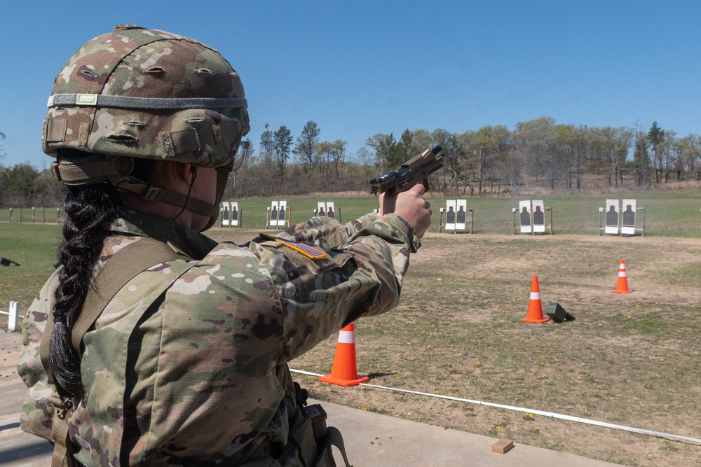 Sgt. Hallie Koches fires an M17 pistol