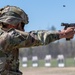 Capt. Kevin Tirado Army Reserve Medical Command, fires an M17 pistol