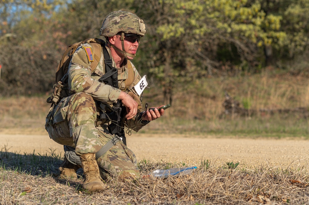 Spc. Robert Marsh looks at his compass
