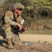Spc. Robert Marsh looks at his compass
