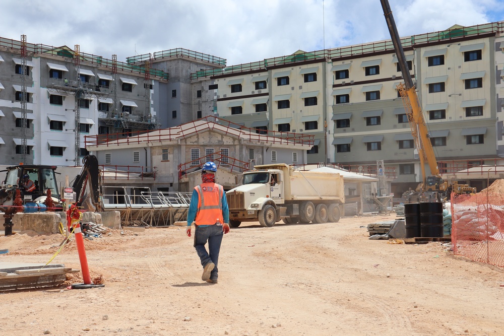 Heavy Equipment Delivers Materials for a Bachelor Enlisted Quarters Under Construction on Camp Blaz