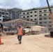 Heavy Equipment Delivers Materials for a Bachelor Enlisted Quarters Under Construction on Camp Blaz