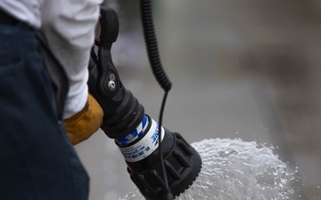 This is fire: U.S. Navy Sailors practice extinguishing fires.