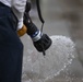 This is fire: U.S. Navy Sailors practice extinguishing fires.