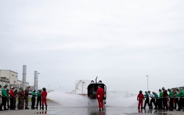 This is fire: U.S. Navy Sailors practice extinguishing fires.