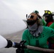 This is fire: U.S. Navy Sailors practice extinguishing fires.