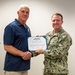 Navy and Marine Corps Force Health Protection Command (NMCFHPC) hosts an award ceremony for Hospital Corpsman First Class Jacqueline Holman and a retirement ceremony for Mr. John Valentine and Mr. Gregory Stone