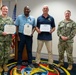 Navy and Marine Corps Force Health Protection Command (NMCFHPC) hosts an award ceremony for Hospital Corpsman First Class Jacqueline Holman and a retirement ceremony for Mr. John Valentine and Mr. Gregory Stone