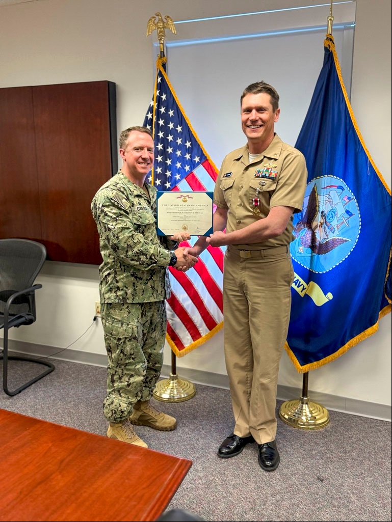 Navy and Marine Corps Force Health Protection Command (NMCFHPC) hosts an award ceremony for Cmdr. Lucas A. Johnson