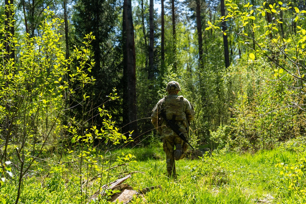 V Corps Soldiers conduct land navigation during best squad competition