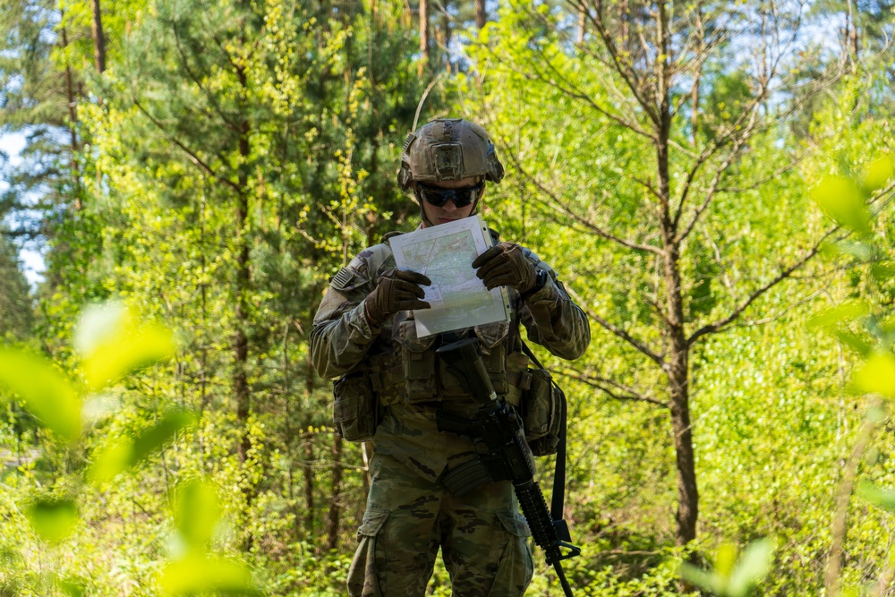 V Corps Soldiers conduct land navigation during best squad competition