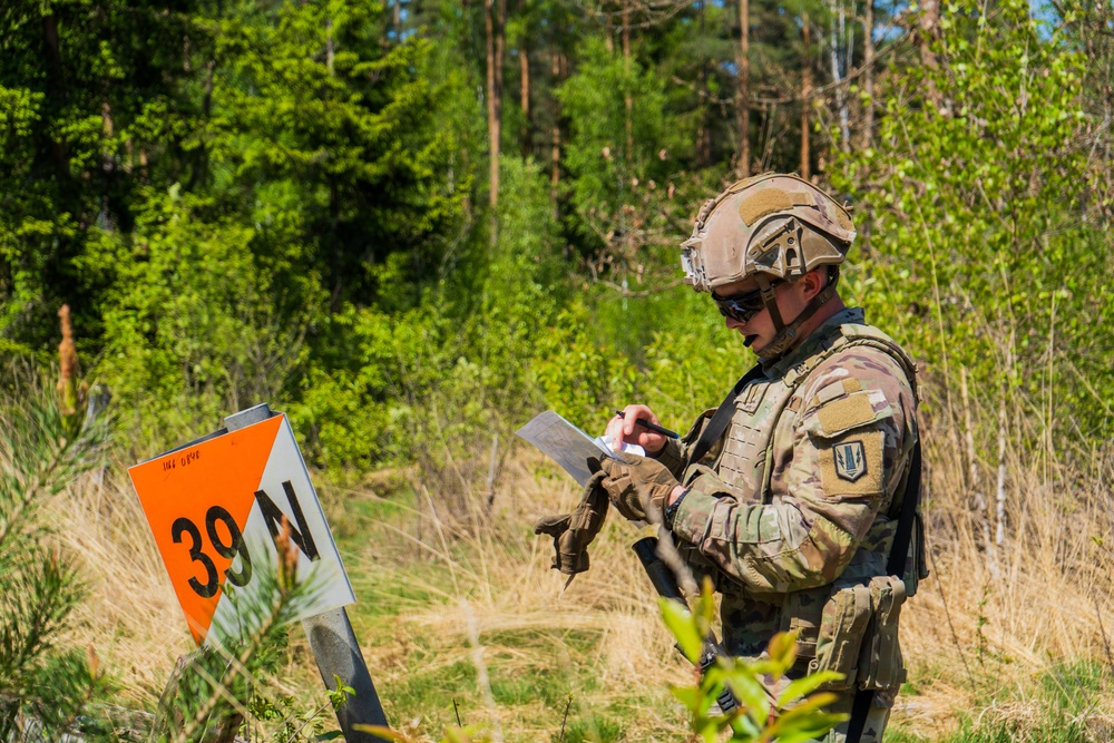 V Corps Soldiers conduct land navigation during best squad competition