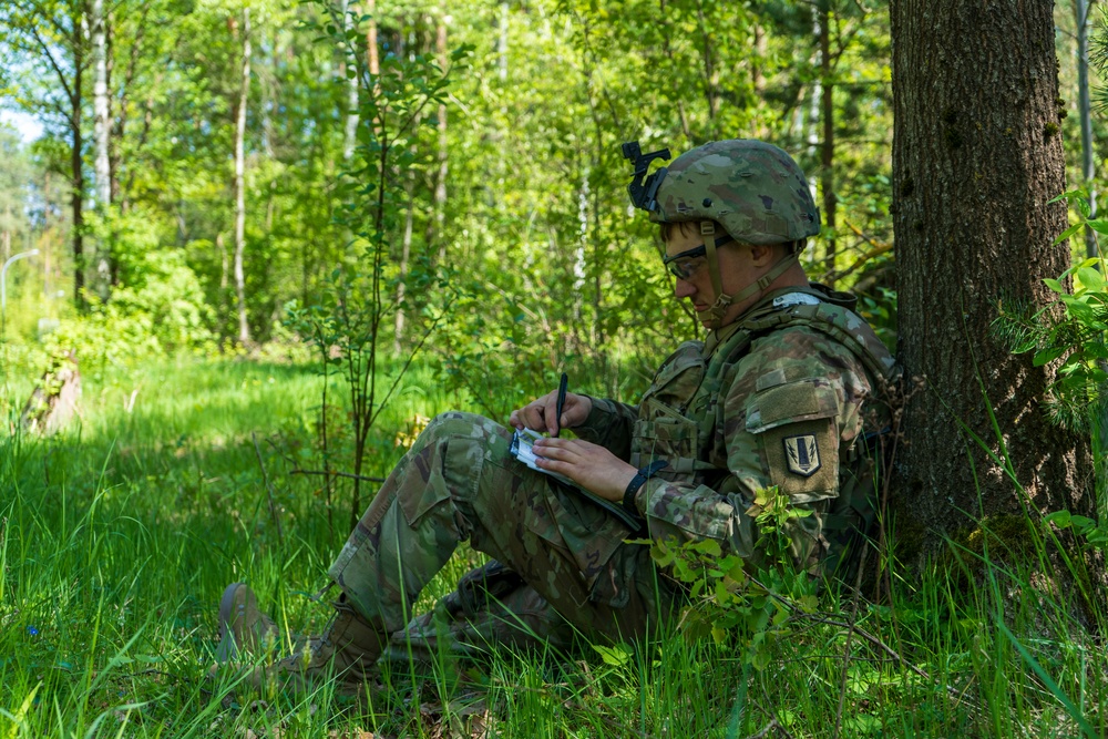 V Corps Soldiers conduct land navigation during best squad competition