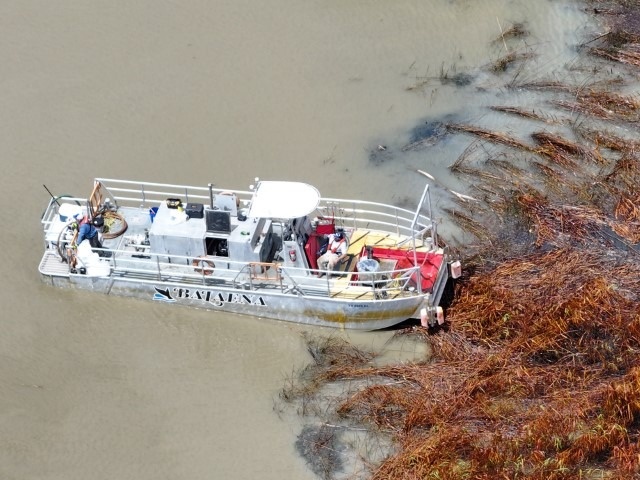 Response crews conduct oil spill clean-ups following Well 59 rupture