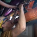 USS Ronald Reagan (CVN 76) Sailors and Puget Sound Naval Shipyard workers secure pipes