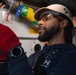 USS Ronald Reagan (CVN 76) Sailors and Puget Sound Naval Shipyard workers secure pipes