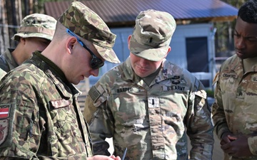 Swift Response 25: Latvian National Armed Forces show Sky Soldiers How To Operate Target Lifters