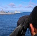 Ensign Marisa Ostrowsky uses a laser range finder while participating in maneuvering drills