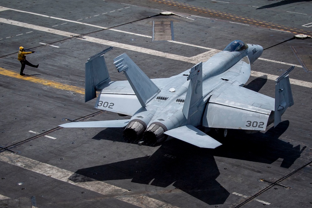 Nimitz Sailor Directs Aircraft